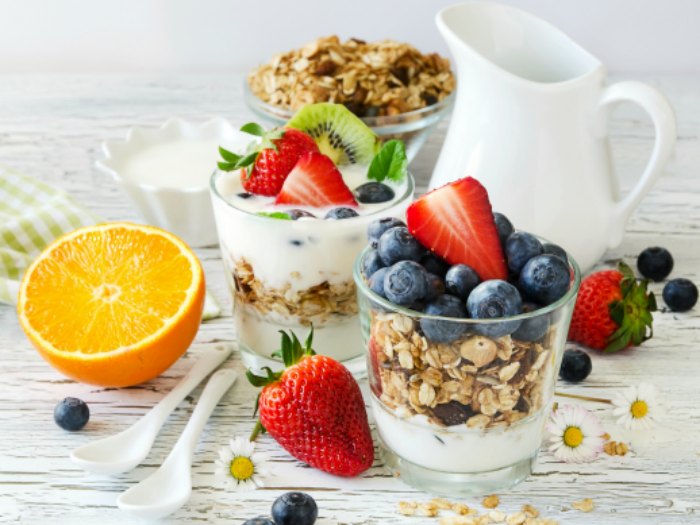 Granola or muesli with berries and fruits for healthy morning meal